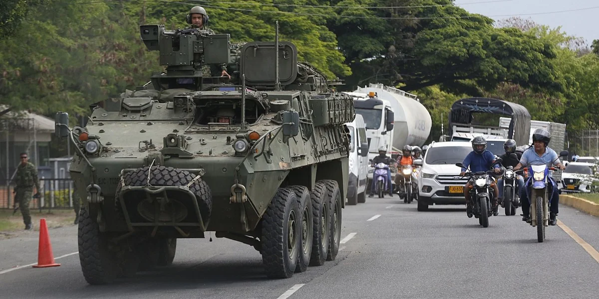 Kolumbianesch Zaldote patrulléiere virun der Presidentestéchwal zu Cali | © EPA/Ernesto Guzmán